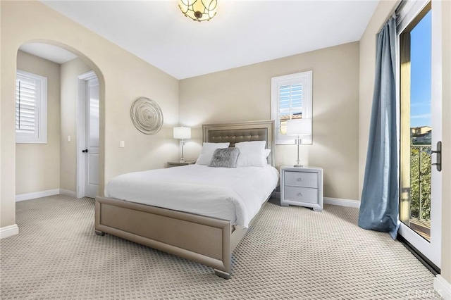 19599 Highland Terrace Dr, Walnut, CA 91789 - bedroom with carpet floors, baseboards, and arched walkways