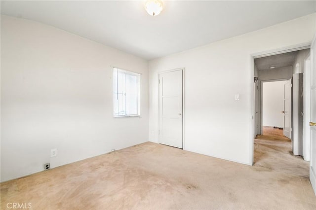 14432 S Cahita Ave, Compton, CA 90220 - unfurnished bedroom featuring light carpet
