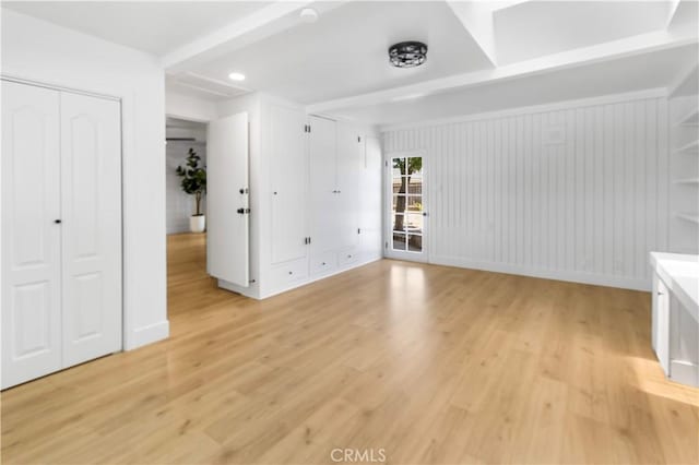 4561 N Price Ave, Fresno, CA 93726 - unfurnished living room with light wood-style floors, baseboards, and recessed lighting