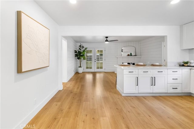 4561 N Price Ave, Fresno, CA 93726 - kitchen with white cabinetry, light wood-style flooring, light countertops, a ceiling fan, and recessed lighting