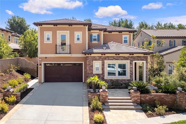 11 Goldenrod, Lake Forest, CA 92630 - view of front of house with stucco siding, an attached garage, concrete driveway, and a tile roof