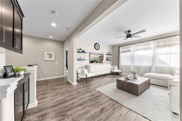 11 Goldenrod, Lake Forest, CA 92630 - living room featuring wood finished floors, a ceiling fan, baseboards, and recessed lighting
