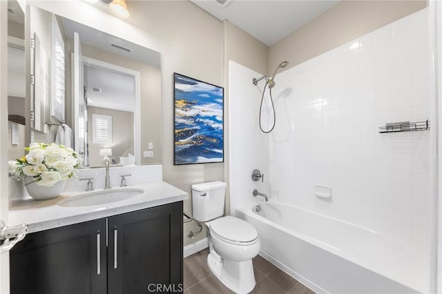 11 Goldenrod, Lake Forest, CA 92630 - bathroom with toilet, vanity,  shower combination, and baseboards