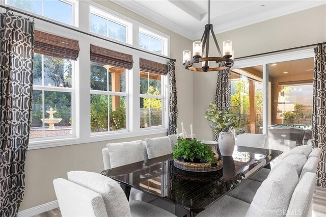 11 Goldenrod, Lake Forest, CA 92630 - dining area featuring a chandelier, ornamental molding, baseboards, and wood finished floors