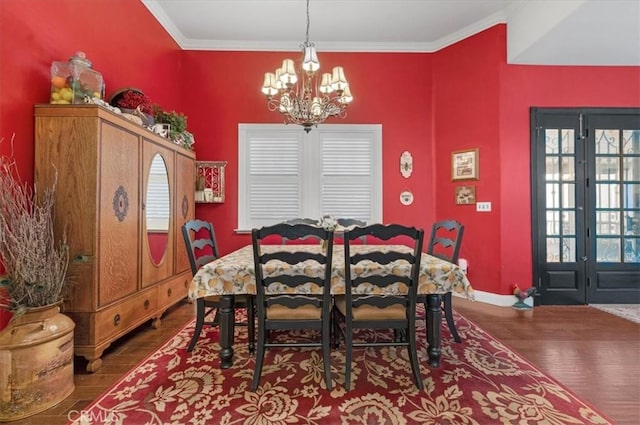 8401 Mayer Ave, Bakersfield, CA 93314 - dining area with a chandelier, wood finished floors, ornamental molding, and baseboards