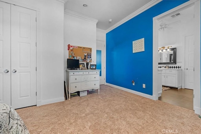 8401 Mayer Ave, Bakersfield, CA 93314 - carpeted bedroom featuring crown molding, baseboards, ensuite bathroom, and a closet