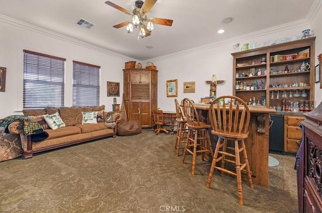 8401 Mayer Ave, Bakersfield, CA 93314 - carpeted living room featuring a ceiling fan, crown molding, and a dry bar