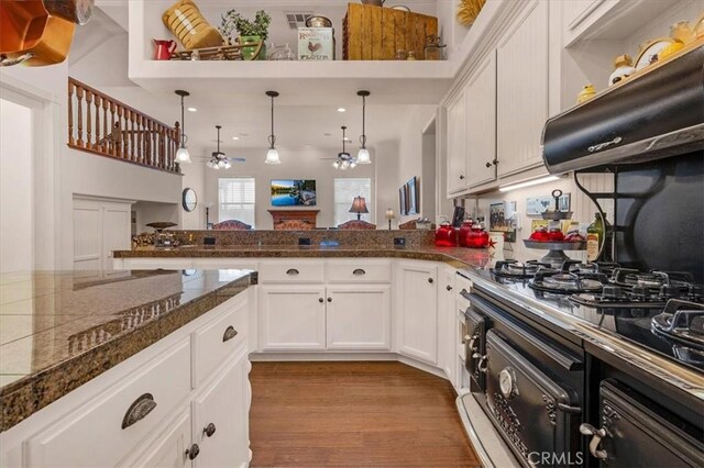 8401 Mayer Ave, Bakersfield, CA 93314 - kitchen with a ceiling fan, tile countertops, white cabinetry, decorative light fixtures, and recessed lighting