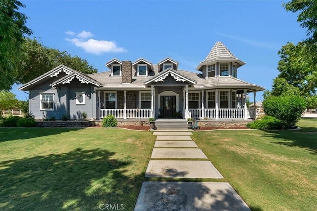 8401 Mayer Ave, Bakersfield, CA 93314 - view of front of house featuring a porch and a front lawn