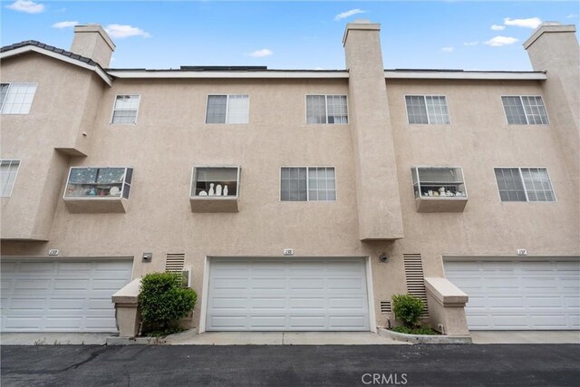 2300 Maple Ave Unit 138, Torrance, CA 90503 - view of property with a garage