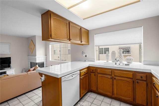 2300 Maple Ave Unit 138, Torrance, CA 90503 - kitchen featuring white dishwasher, open floor plan, and brown cabinets