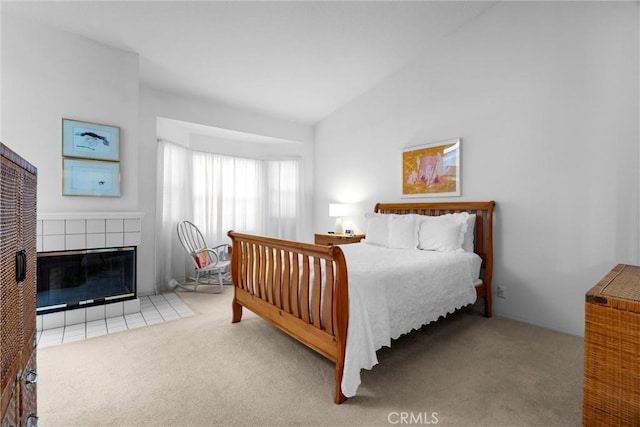 2300 Maple Ave Unit 138, Torrance, CA 90503 - bedroom featuring carpet, a tiled fireplace, and lofted ceiling