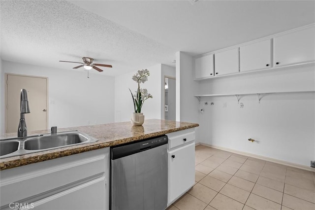 548 Bonita St, San Pedro, CA 90731 - kitchen featuring dishwasher, a ceiling fan, white cabinetry, light tile patterned flooring, and a textured ceiling