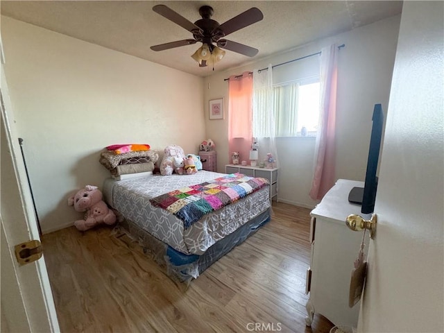 27441 Villa Ave, Highland, CA 92346 - bedroom featuring light wood finished floors, baseboards, and a ceiling fan
