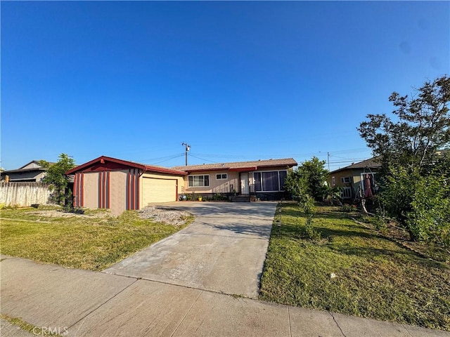 27441 Villa Ave, Highland, CA 92346 - ranch-style home with driveway, an outbuilding, and a garage