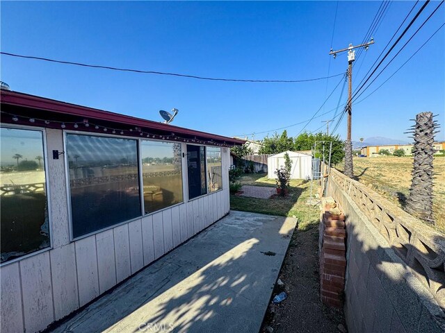 27441 Villa Ave, Highland, CA 92346 - view of patio featuring a sunroom