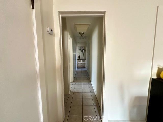 27441 Villa Ave, Highland, CA 92346 - corridor with light tile patterned floors