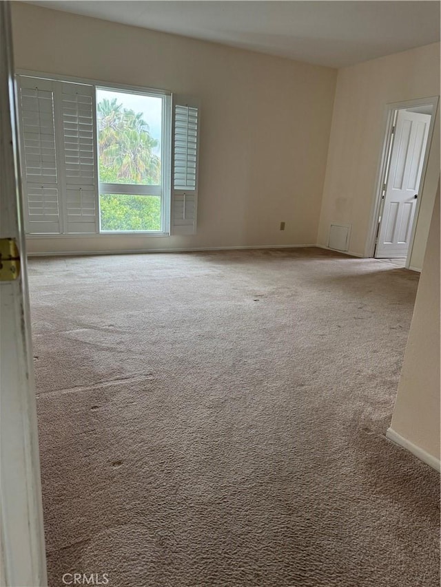 19029 Nordhoff St Unit 309, Northridge, CA 91324 - carpeted empty room with baseboards