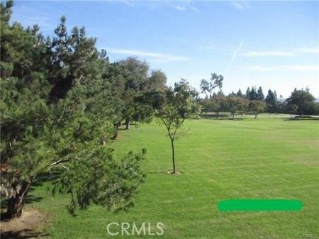 70 Costero Aisle Unit 304, Irvine, CA 92614 - view of community featuring a yard