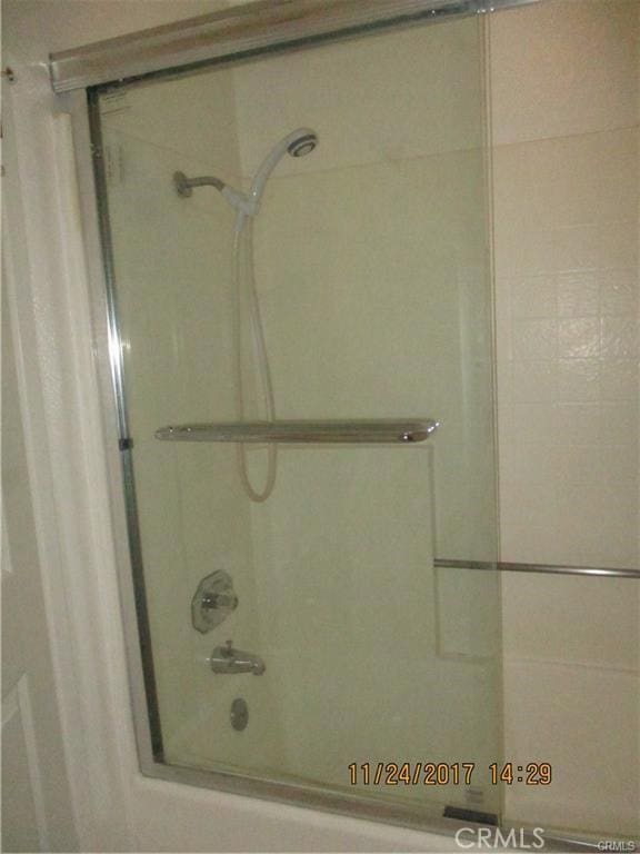 70 Costero Aisle Unit 304, Irvine, CA 92614 - full bathroom featuring combined bath / shower with glass door
