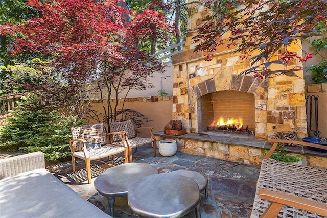 29025 Red Grouse Ct, Lake Arrowhead, CA 92352 - view of patio / terrace with an outdoor stone fireplace