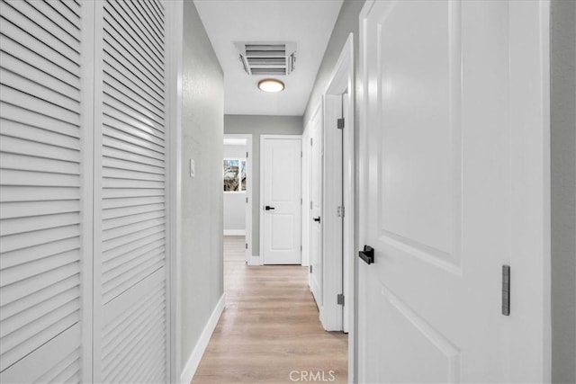 73461 El Paseo Dr Unit 29, Palms, CA 92277 - hallway with light wood-style flooring and baseboards