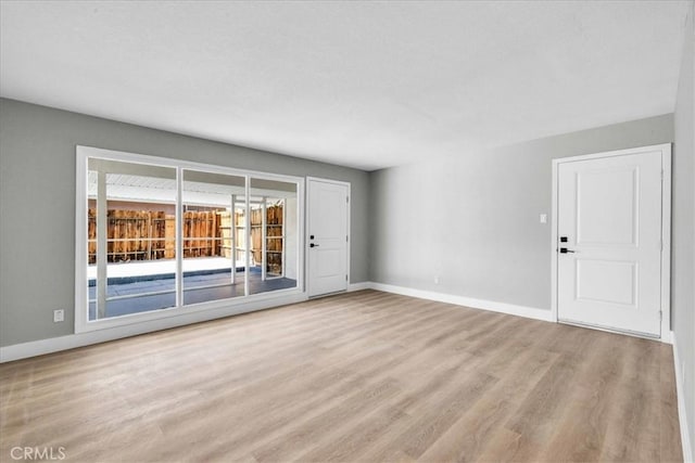 73461 El Paseo Dr Unit 29, Palms, CA 92277 - empty room featuring wood finished floors and baseboards