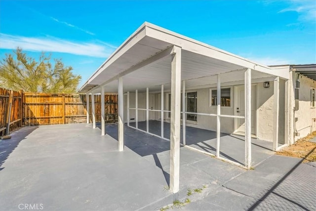 73461 El Paseo Dr Unit 29, Palms, CA 92277 - view of patio / terrace featuring a carport