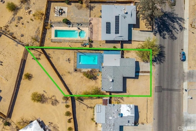 73461 El Paseo Dr Unit 29, Palms, CA 92277 - aerial view of property's location with a pool and property parcel outlined