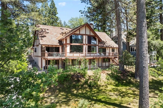 524 Golf Course Rd, Lake Arrowhead, CA 92352 - back of property featuring a deck, stairs, and a chimney