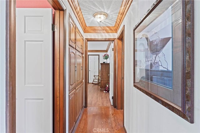 524 Golf Course Rd, Lake Arrowhead, CA 92352 - corridor featuring crown molding and light wood-style floors