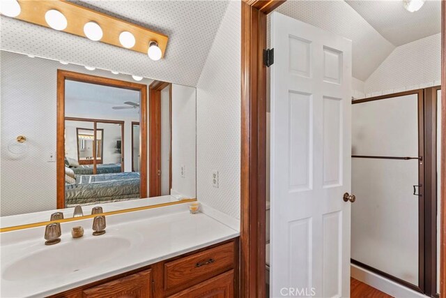 524 Golf Course Rd, Lake Arrowhead, CA 92352 - bathroom featuring ensuite bath, vanity, vaulted ceiling, and a shower stall