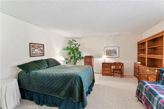 524 Golf Course Rd, Lake Arrowhead, CA 92352 - bedroom with a textured ceiling and carpet floors