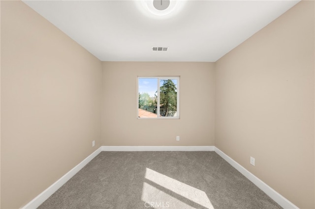 565 N Meridian Ave, San Bernardino, CA 92410 - carpeted empty room featuring baseboards