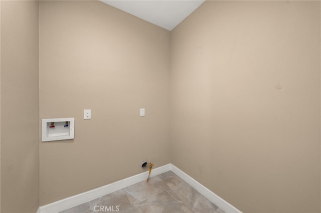 565 N Meridian Ave, San Bernardino, CA 92410 - washroom with washer hookup and baseboards