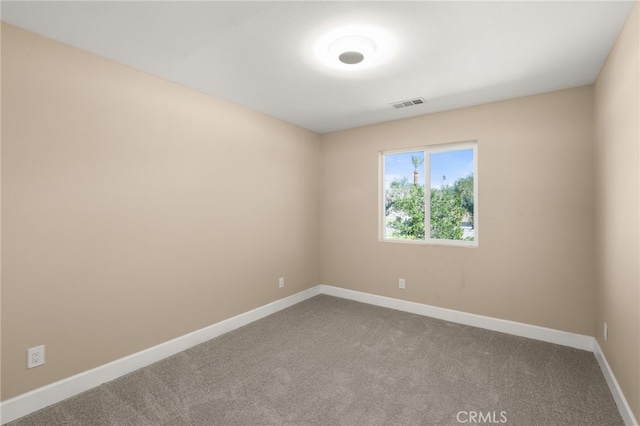 565 N Meridian Ave, San Bernardino, CA 92410 - carpeted empty room with baseboards