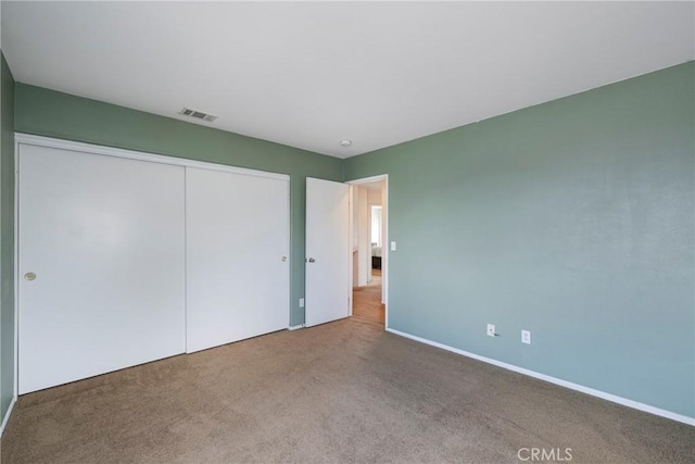 13324 Morningside St, Hesperia, CA 92344 - unfurnished bedroom featuring carpet floors, a closet, and baseboards