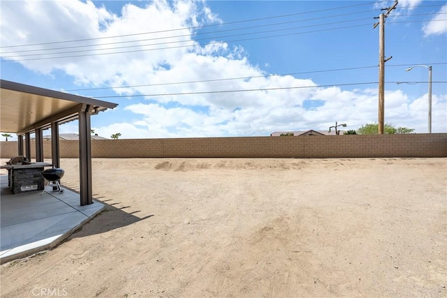 13324 Morningside St, Hesperia, CA 92344 - fenced backyard featuring a patio area