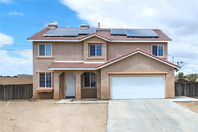 13324 Morningside St, Hesperia, CA 92344 - view of front of property with a tile roof, roof mounted solar panels, stucco siding, concrete driveway, and a garage