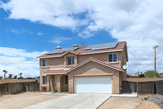 13324 Morningside St, Hesperia, CA 92344 - view of front facade with stucco siding, a fenced backyard, and solar panels