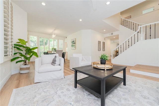 2115 Via Viejo, San Clemente, CA 92673 - living room with wood finished floors, stairway, recessed lighting, and a chandelier