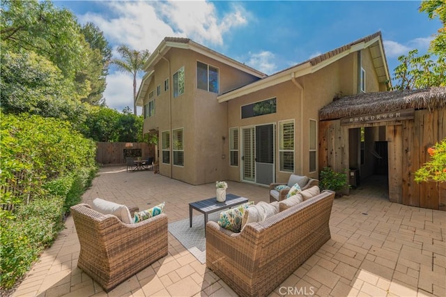 2115 Via Viejo, San Clemente, CA 92673 - rear view of house featuring stucco siding, a patio area, and outdoor lounge area