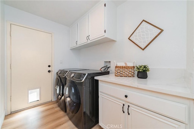 2115 Via Viejo, San Clemente, CA 92673 - washroom featuring cabinet space, separate washer and dryer, and light wood-type flooring