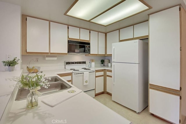 2800 Keller Dr Unit 282, Tustin, CA 92782 - kitchen with white appliances, light countertops, and white cabinetry
