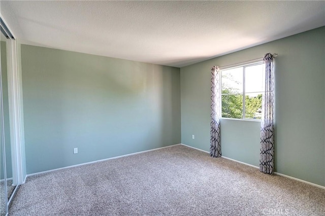 19068 Sunflower Pl, Riverside, CA 92508 - carpeted spare room with baseboards and a textured ceiling