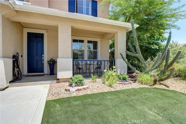 19068 Sunflower Pl, Riverside, CA 92508 - entrance to property with covered porch, stucco siding, and a lawn