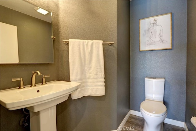 19068 Sunflower Pl, Riverside, CA 92508 - half bathroom featuring toilet and wood finished floors