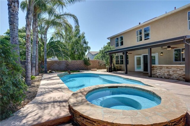 19068 Sunflower Pl, Riverside, CA 92508 - view of pool featuring a ceiling fan, a fenced backyard, a patio, and a pool with connected hot tub