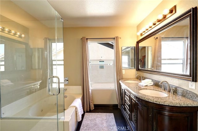 19068 Sunflower Pl, Riverside, CA 92508 - bathroom featuring double vanity, a combined bath / shower with jetted tub, and wood finished floors