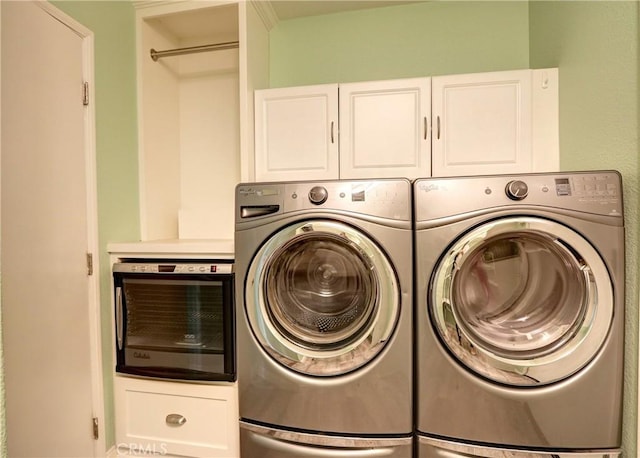 19068 Sunflower Pl, Riverside, CA 92508 - laundry room featuring washing machine and clothes dryer and cabinet space